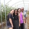 Sonny and Sharon Shimaoka with grandchildren in their cherry tomato greenhouse
